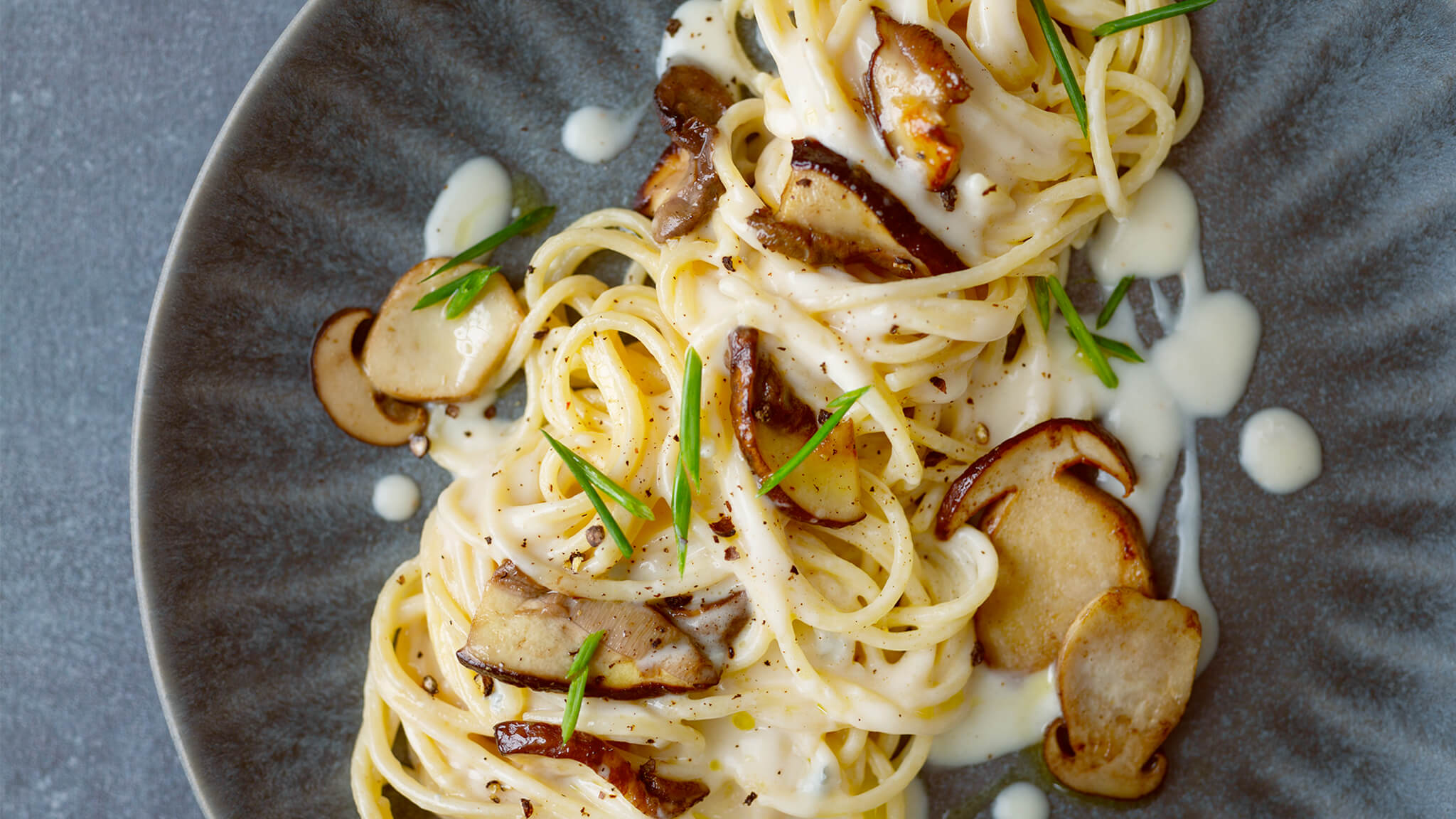 Spaghetti rigati con porcini e fonduta di bitto Agnesi